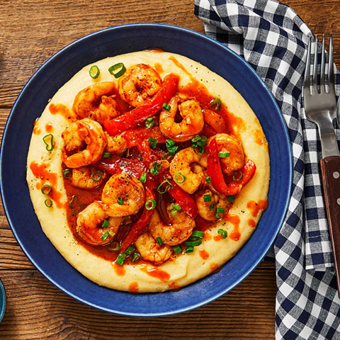 http://colmoniscatering.com/wp-content/uploads/2021/01/low-country-shrimp-grits_480px.jpg